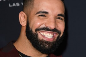 Дрейк побил три рекорда Beatles и сделал в честь этого татуировку